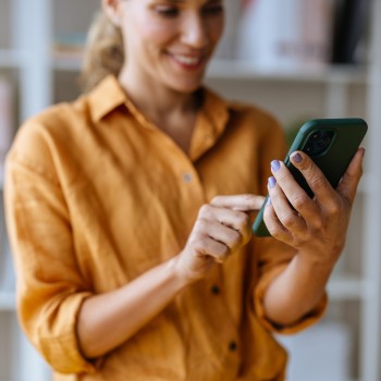 A person uses a mobile phone.