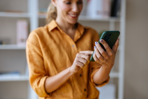 A person uses a mobile phone.