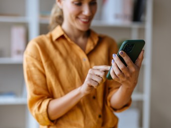 A person uses a mobile phone.