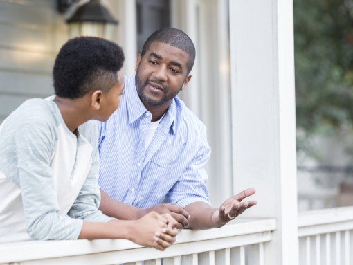 man talks to his son 